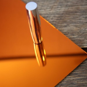 Tester plexi lustro miedziano-pomarańczowe - odbicie rzeczywiste